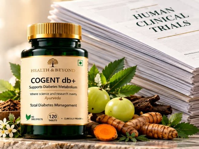 A bottle of Cogent Diabetes+ in front of a stack of papers titled Human Clinical Trials
